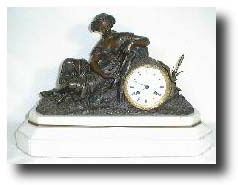 French Bronze Figural on White Marble Base, circa 1850 — Antique Clocks Price Guide
