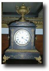 Ansonia Black Iron with Urn, circa 1900 — Antique Clocks Price Guide