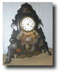 Cast Iron Front Mantel Clock , circa 1850 — Antique Clocks Price Guide