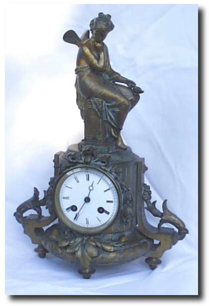 French Figural Clock, Winged Maiden, c. late 1800's — Antique Clocks Price Guide