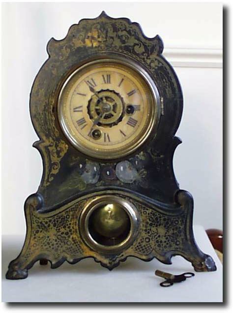 Painted Cast Iron Front Clock, c. 1850 - 1860 — Antique Clocks Price Guide