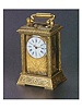 Gilt bronze, hour and half hour striking, hour repeating, centre-seconds mignonette carriage clock. Swiss, made for the Chinese Market, circa 1880.