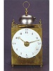 Fine brass, eight-day going, quarter striking Capucine type travelling clock with alarm. French, Jura, circa 1800.