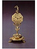 Gilt bronze monstrance table clock, German, circa 1620, the later movement by Jans.