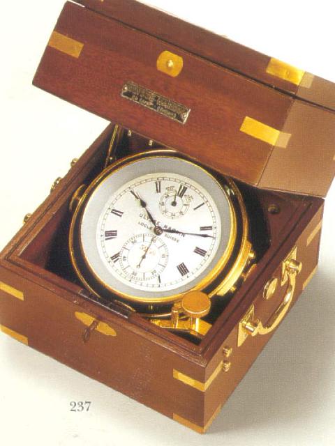 Fine mahogany two-day marine chronometer with winding indicator. Ulysse Nardin, Locle, Suisse, circa 1947. — Antique Clocks Price Guide