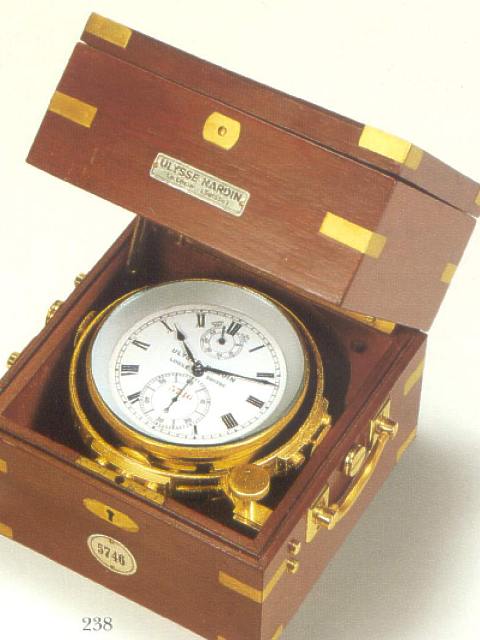 Fine mahogany two-day marine chronometer with winding indicator. Ulysse Nardin, Locle, Suisse, circa 1950. — Antique Clocks Price Guide