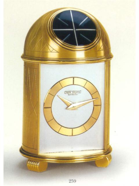 Very fine gilt brass solar-powered table clock based on a mechanical movement. Patek Philippe &amp; Cie. circa 1958. — Antique Clocks Price Guide