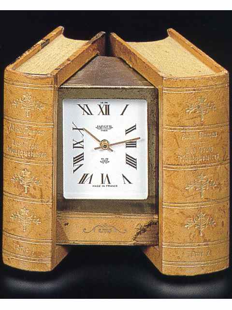 Fine battery powered timepiece designed as a pair of books. Jaeger, made in the 1960's. — Antique Clocks Price Guide