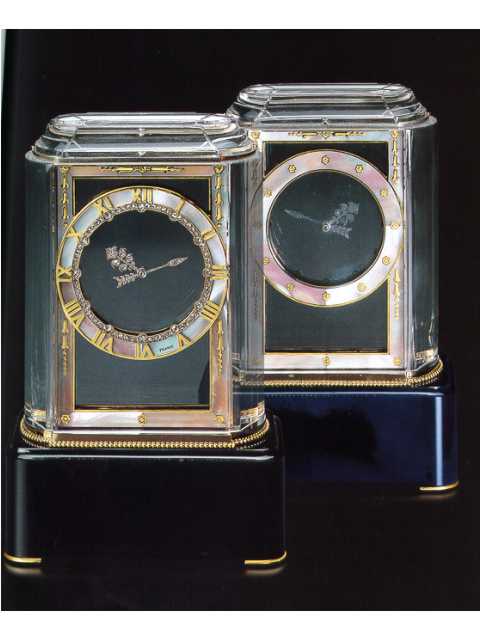 18K gold, rock crystal and onyx, diamond-set, eight-day going Mystery clock, Cartier, Paris, circa 1925. — Antique Clocks Price Guide