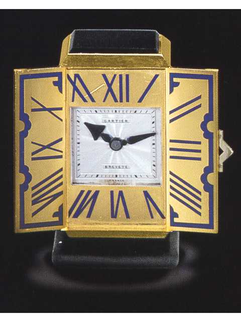 18K yellow gold, enamel and onyx, eight day going miniature table clock a volets. Cartier, Paris, circa 1930. — Antique Clocks Price Guide