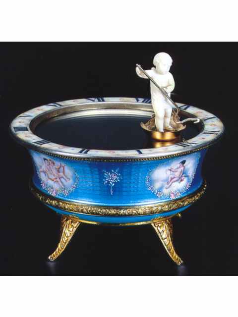 Silver gilt and enamel, eight-day going table timepiece with horizontal dial. Arnold &amp; Steinwachs, Geneve, circa 1910. — Antique Clocks Price Guide