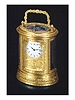 gilt brass, oval eight-day going, quarter repeating, small carriage clock. A. B. V., France, circa 1890.