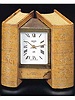 Fine battery powered timepiece designed as a pair of books. Jaeger, made in the 1960's.