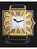 18K yellow gold, enamel and onyx, eight day going miniature table clock a volets. Cartier, Paris, circa 1930.