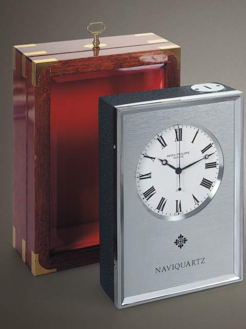 "Naviquartz", mahogany electronic chronometer with center-seconds with original certificate and manual. Patek Philippe &amp; Cie., circa 1973. — Antique Clocks Price Guide