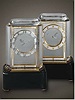 "Pendule Mysterieuse Modele A", 18K gold and rock crystal eight day going Mystery clock, Cartier, Paris, circa 1925.
