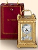 Exceptionally rare and equally fine eight-day going gilt brass astronomical Grande et Petite Sonnerie carriage clock with perpetual calendar, phases of the moon, year indication, alarm and special escapement in original leather fitted box. Breguet, No. 2516, sold to Baron de Blome for 2000 Francs in 1811.