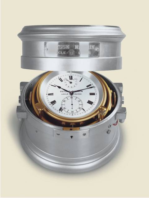 Fine and rare prototype, 2 day-going marine chronometer with special balance and power reserve indication, in its water-resistant aluminum and nickel cylindrical box. Ulysse Nardin, Locle, Suisse, circa 1940. — Antique Clocks Price Guide