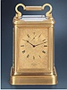 "Giant" gilt brass 8 day-going double-train carriage clock striking and repeating the hours. James Mc Cabe, London, circa 1850.