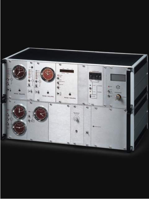 Very fine integrated Electronic Master Clock System, two-module tower. Patek Philippe &amp; Cie., Geneve, circa 1980. — Antique Clocks Price Guide