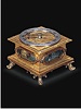 Rare gilt metal single hand small hour-striking horizontal table clock. French, circa 1670.