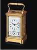 Gilt brass, eight day-going carriage clock with alarm and retrograde calendar. French, circa 1870.