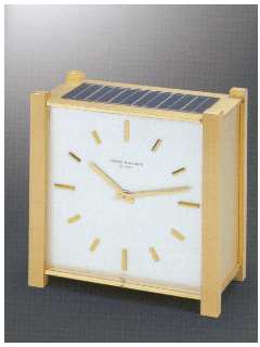 Solar-powered electric table clock in original fitted box. Patek Philippe &amp; Cie. made in the 1970's. — Antique Clocks Price Guide