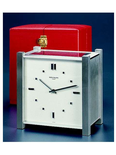 Solar-powered electric table clock in original fitted box. Patek Philippe &amp; Cie. circa 1965. — Antique Clocks Price Guide