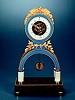 Gilt bronze, grillotte red marble and enamel eight-day going, hour and half-hour striking skeleton clock with Republican calendar. Ridel a Paris, circa 1805,