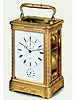 Gilt brass eight-day going, petite sonnerie, quarter repeating, carriage clock with alarm and chronometer escapement, in fitted box. Patek et Cie. a Geneve, circa 1850.