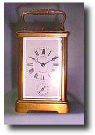 Strike, repeat and alarm carriage clock — Antique Clocks Price Guide