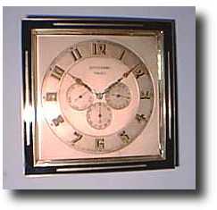 French Art Deco silvered brass and black enamel 8-day calendar desk clock, c. 1920 — Antique Clocks Price Guide
