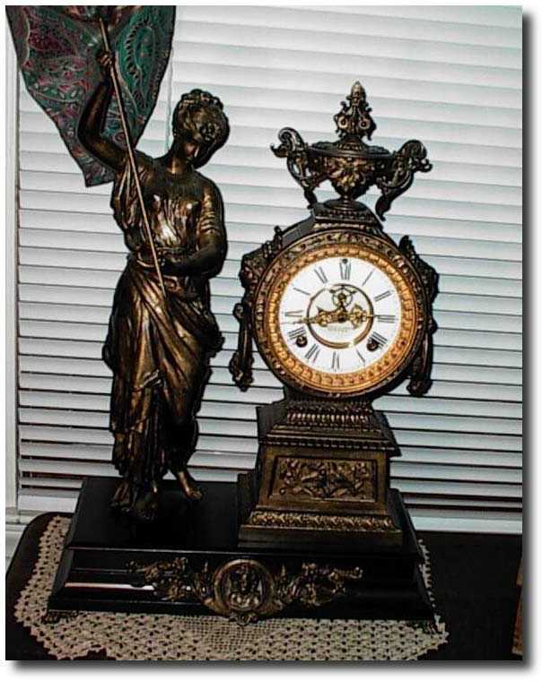 Ansonia Standing Statue Clock — Antique Clocks Price Guide