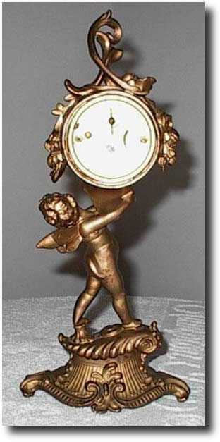 Gilbert Cherub Novelty clock — Antique Clocks Price Guide