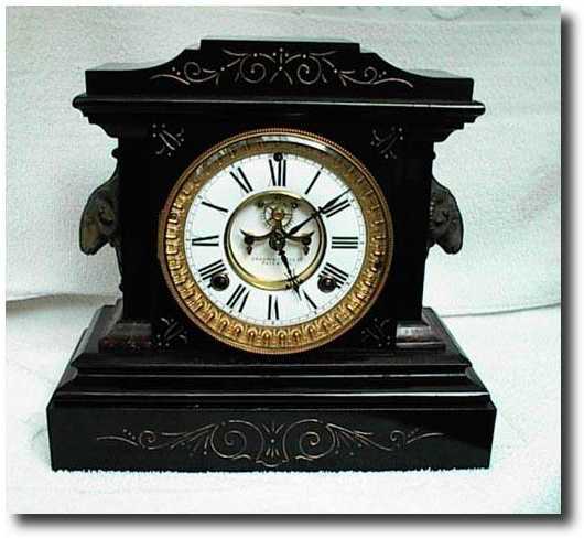 Ansonia black Enameled case mantel clock with visible escapement — Antique Clocks Price Guide