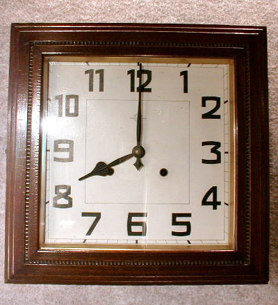 THIS IS A JAPANESE SQUARE CASED DIAL CLOCK. CIRCA 1925-35. — Antique Clocks Price Guide