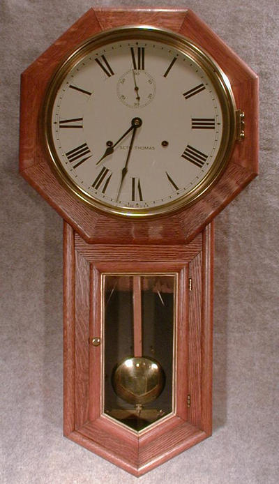 SETH THOMAS "WORLD" WALL CLOCK IN AN OLD OAK CASE. CIRCA 1905-15. — Antique Clocks Price Guide