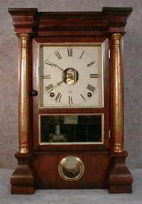 SETH THOMAS "COLUMN" MANTEL CLOCK. ROSEWOOD VENEERED CASE WITH ANTIQUED GILT COLUMNS. CIRCA 1910. — Antique Clocks Price Guide