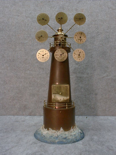 WORLD TIME LIGHTHOUSE CLOCK BY JUNGHANS. CIRCA 1910. — Antique Clocks Price Guide