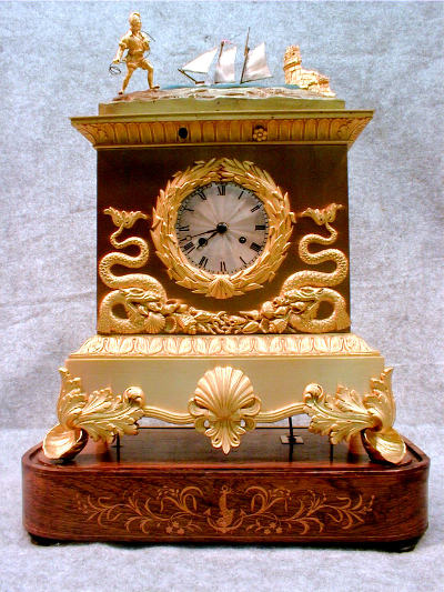THIS IS A FRENCH AUTOMATON ROCKING SHIP MANTEL CLOCK IN A GILT CASE CIRCA 1810-1825. — Antique Clocks Price Guide