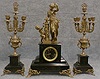 THIS IS A LARGE FRENCH CLOCK AND CANDLEABRA SET. CIRCA 1900.