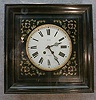 FRENCH PICTURE FRAME CLOCK IN A SQUARE CASE. BRASS AND ENAMEL INLAY. CIRCA 1870'S.