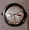 THIS IS A CHELSEA 6" HINGED PHENOLIC CASED "RADIO ROOM" SHIP's CLOCK TIMEPIECE. CIRCA 1944