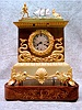 THIS IS A FRENCH AUTOMATON ROCKING SHIP MANTEL CLOCK IN A GILT CASE CIRCA 1810-1825.