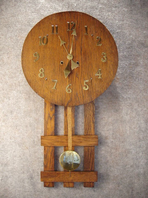 "Gordon" Model Round Top Mission Oak Wall Clock By The New Haven Clock Co. Circa1910-1915. — Antique Clocks Price Guide