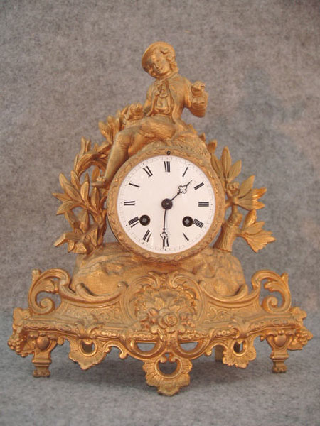 French Mantel Clock In A Gold Finish Spelter Case. — Antique Clocks Price Guide