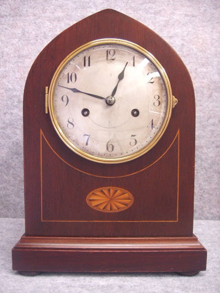 German Lancet Top Mantel Clock With Inlay And Satin Banding In A Mahogany Veneered Case, By Badische Urhenfabrik, Furtwangen, Germany.  Circa 1910-1920. — Antique Clocks Price Guide