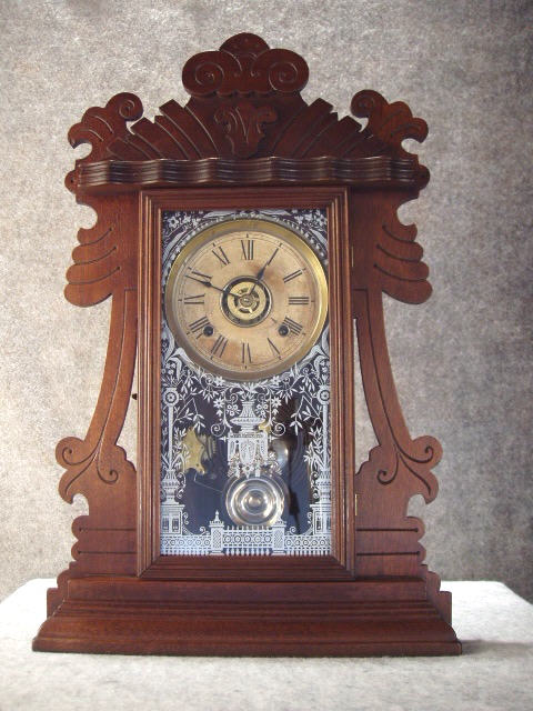 This Is The "Joslyn" (From The "J" Assortment) Walnut Shelf Clock By The Ansonia Clock. Circa 1900-1910. — Antique Clocks Price Guide