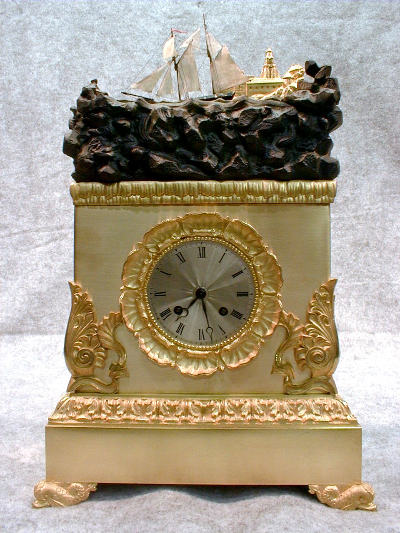French Automaton Rocking Ship Mantel Clock In A Gilt And Bronze Case With An 8 Day Silk Thread Suspension Movement That Strikes The Hours And 1/2 Hours On A Bell. — Antique Clocks Price Guide
