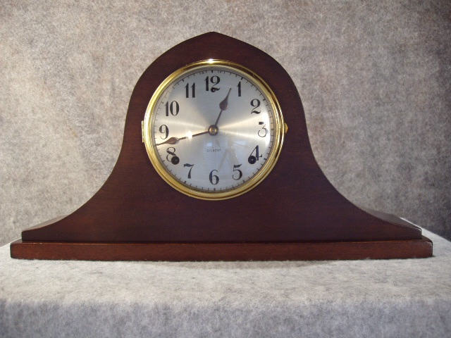 Tambour Style Mantel Clock In A Soft Wood Case With A Dark Walnut Finish, By The Gilbert Clock Co. Circa 1920-1930. — Antique Clocks Price Guide